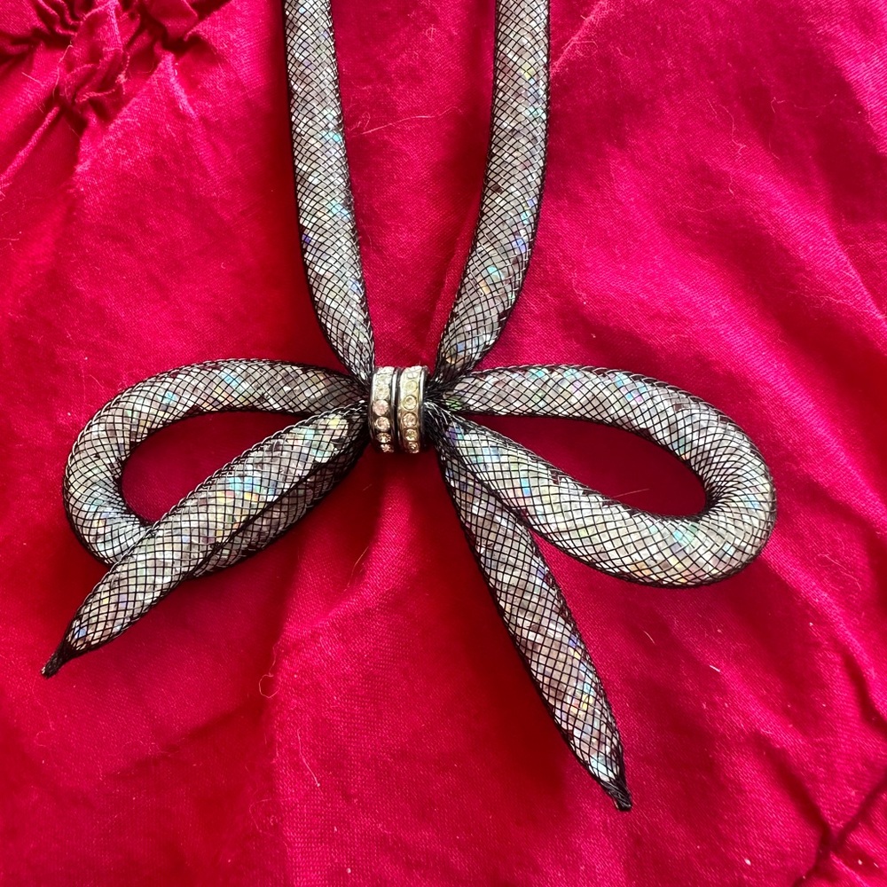 Betsy Johnson bow necklace. Will only communicate via Poshmark!